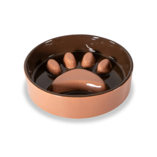 La Gamelle 16 cm Patte est une gamelle ronde, marron et beige, avec des empreintes de pattes en relief à l'intérieur pour ralentir la prise de nourriture.