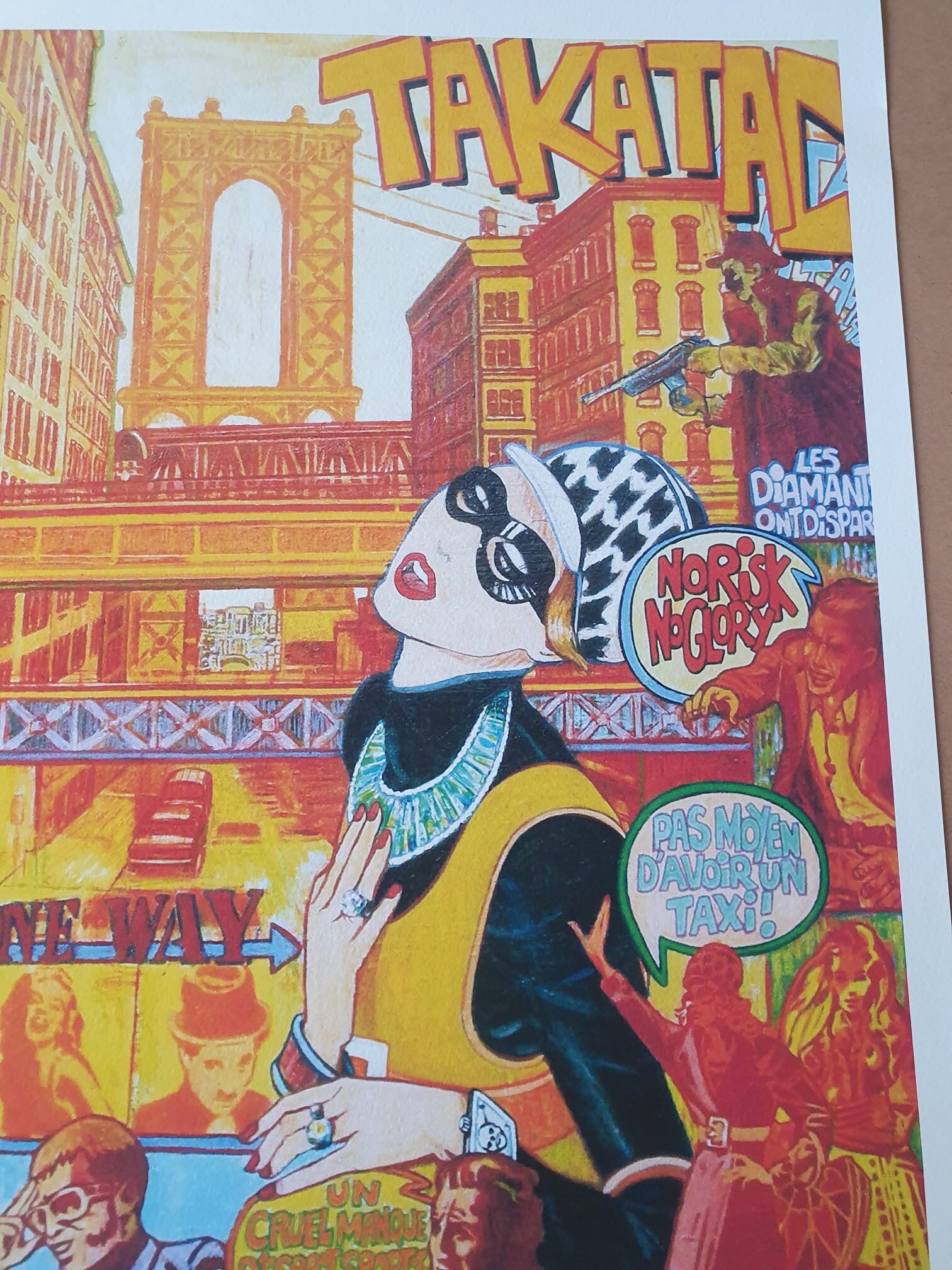 Une lithographie aux couleurs vives, dans le style bande dessinée, intitulée « Marc Ferrero – Takatac » (50 × 70 cm), représentant une femme élégante portant des lunettes de soleil et des bijoux, sur fond de paysage urbain avec un pont, l'inscription « TAKATAK » et des bulles de dialogue en français.