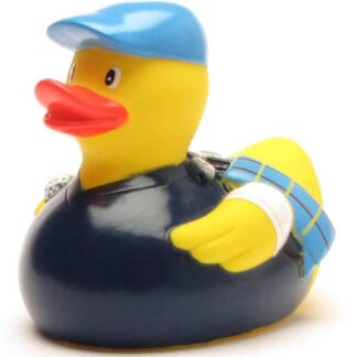 Un canard en caoutchouc jaune déguisé en joueur de baseball, portant une casquette et un maillot bleus, ainsi qu'un brassard blanc, et tenant une batte bleue et jaune sous son aile.
