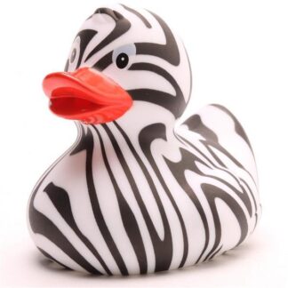 On voit un canard en caoutchouc aux rayures zébrées noires et blanches et au bec orange, sur fond blanc.