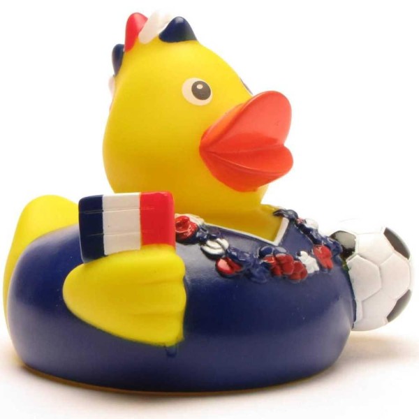 Un canard de bain « Fan de football France » : un canard en caoutchouc déguisé en supporter de l'équipe de football française, tenant un drapeau français et un ballon de foot.